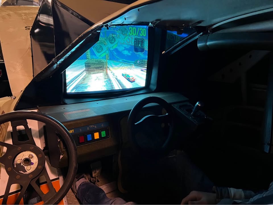 An Examination of a 1990s NASCAR Simulation Setup Showcasing Daytona USA