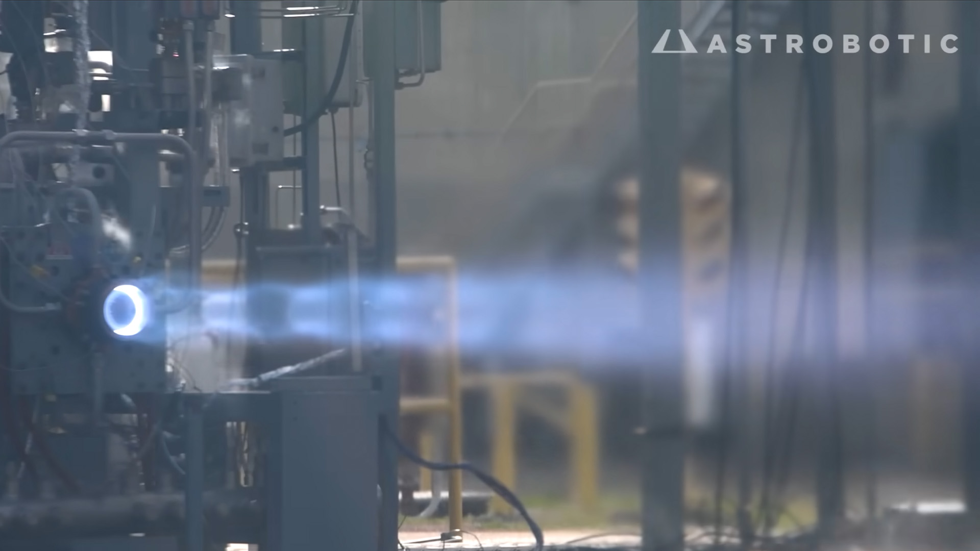 Examination of the Spiral Exhaust Flame Produced by a Rotating Detonation Rocket Engine