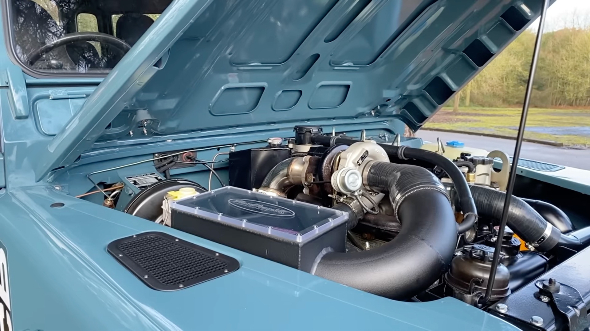 Invest Your Tax Refund in a Backhoe-Powered Land Rover Defender