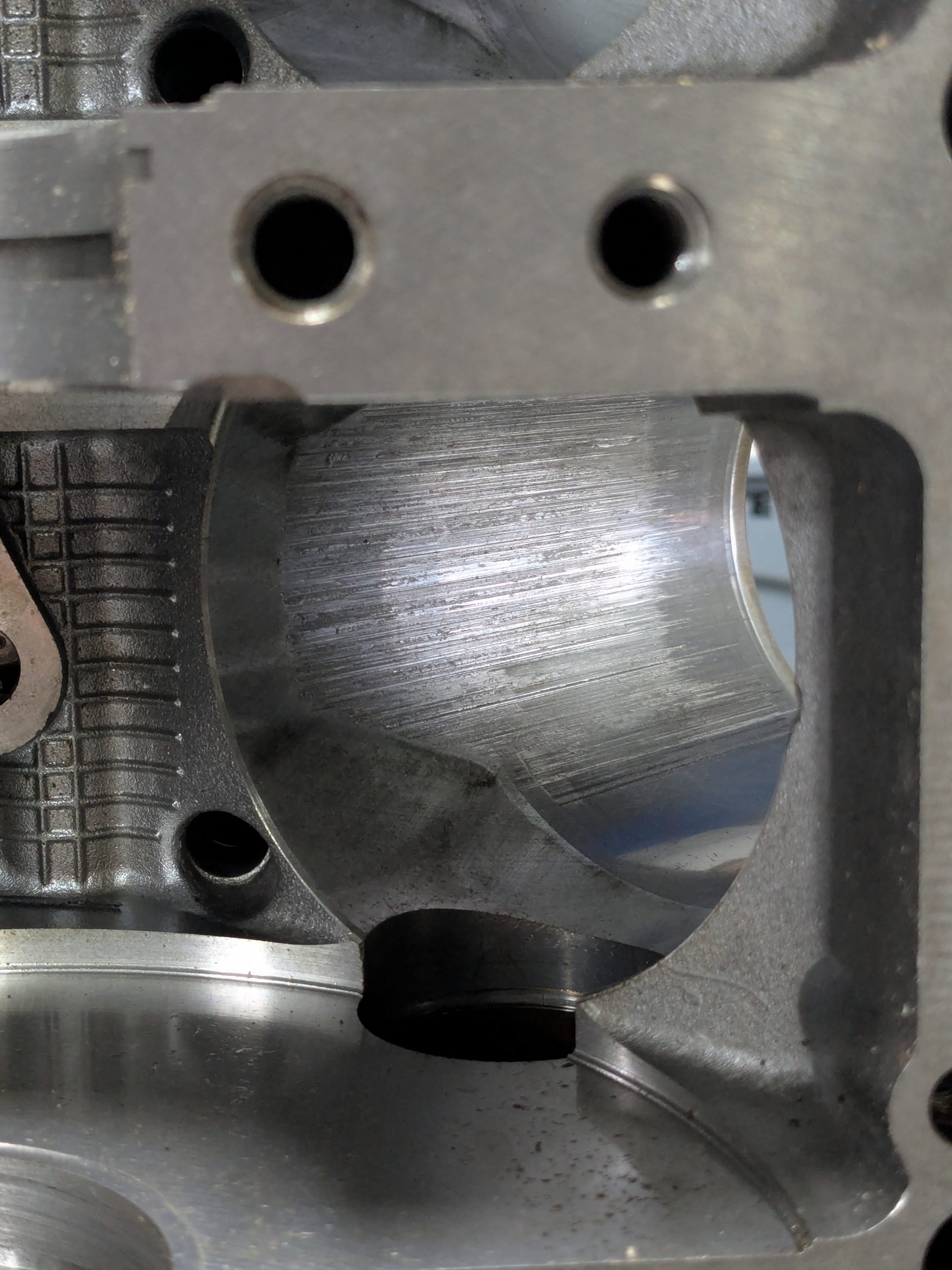 A Comprehensive Examination of Porsche Bore Scoring: Background and Recent Advances