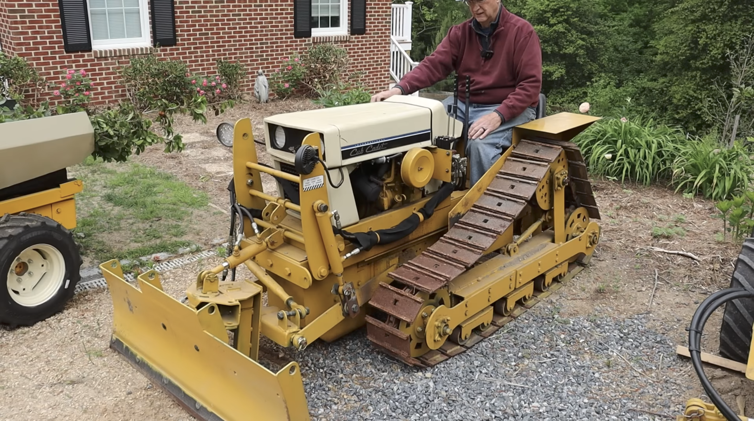 DIY Aficionado Builds Extensive Task Force Including Mini Bulldozer and Road Grader Using Lawn Tractor Blueprints