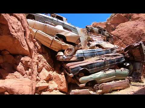 The Unveiling of Vintage Automobiles Piled in a Utah Canyon: A Study of Their Origin and Background