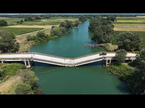 Local Motorists Persist in Utilizing Damaged Bridge Despite Detour for Time Efficiency