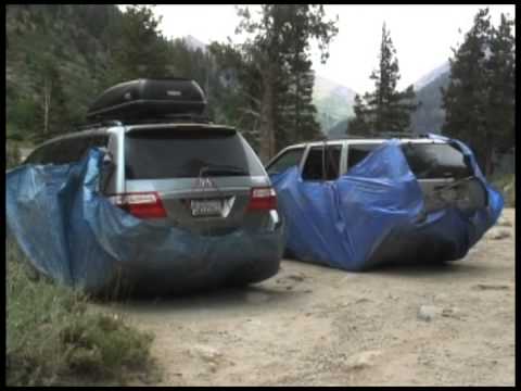 Campers Utilize Tarps to Shield Vehicles from Antifreeze-Loving Marmots
