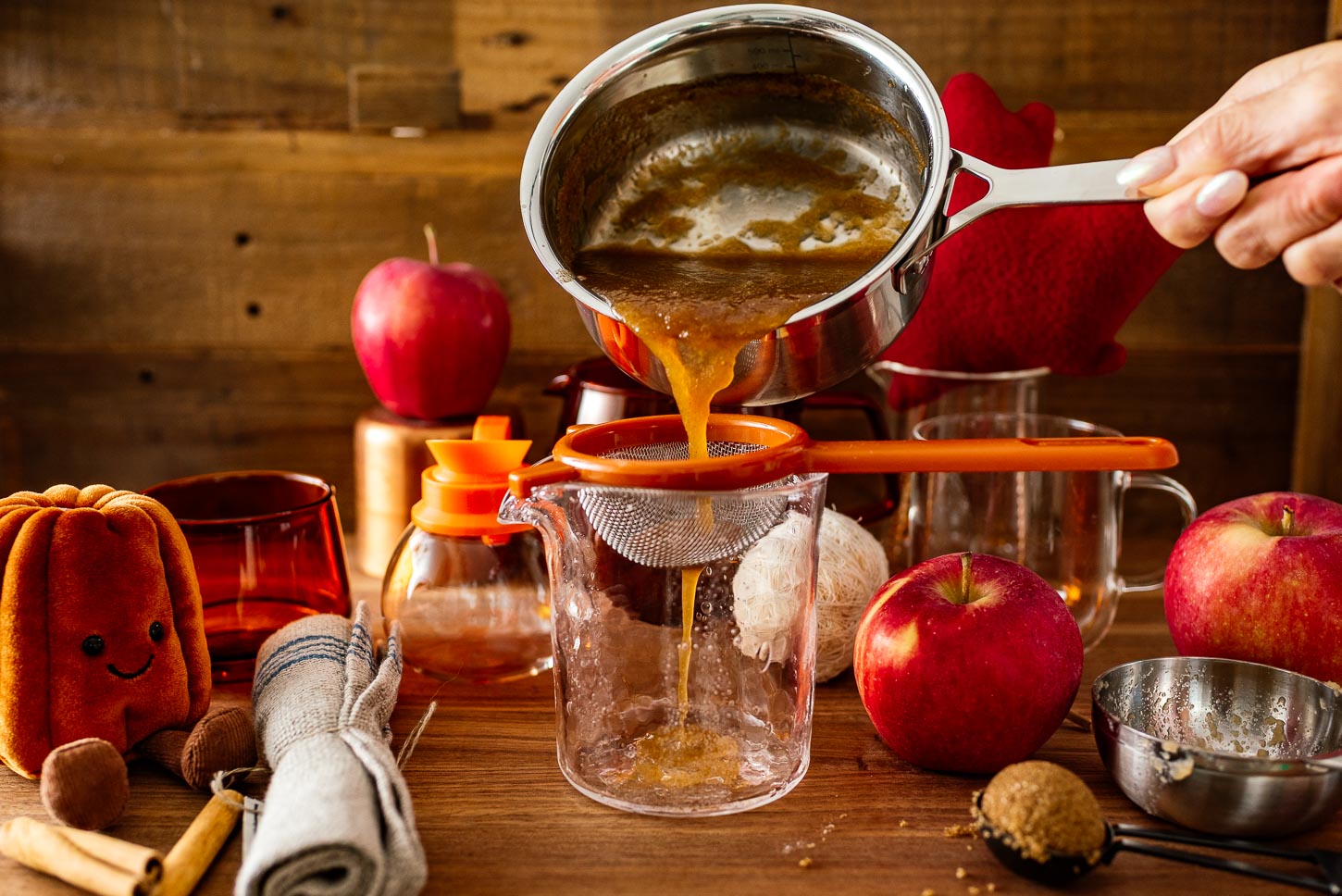 straining salted caramel apple sauce