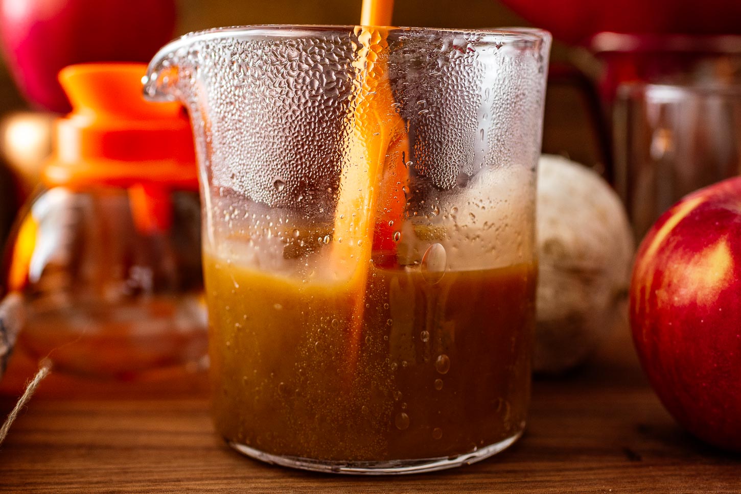 stirring salted caramel apple syrup