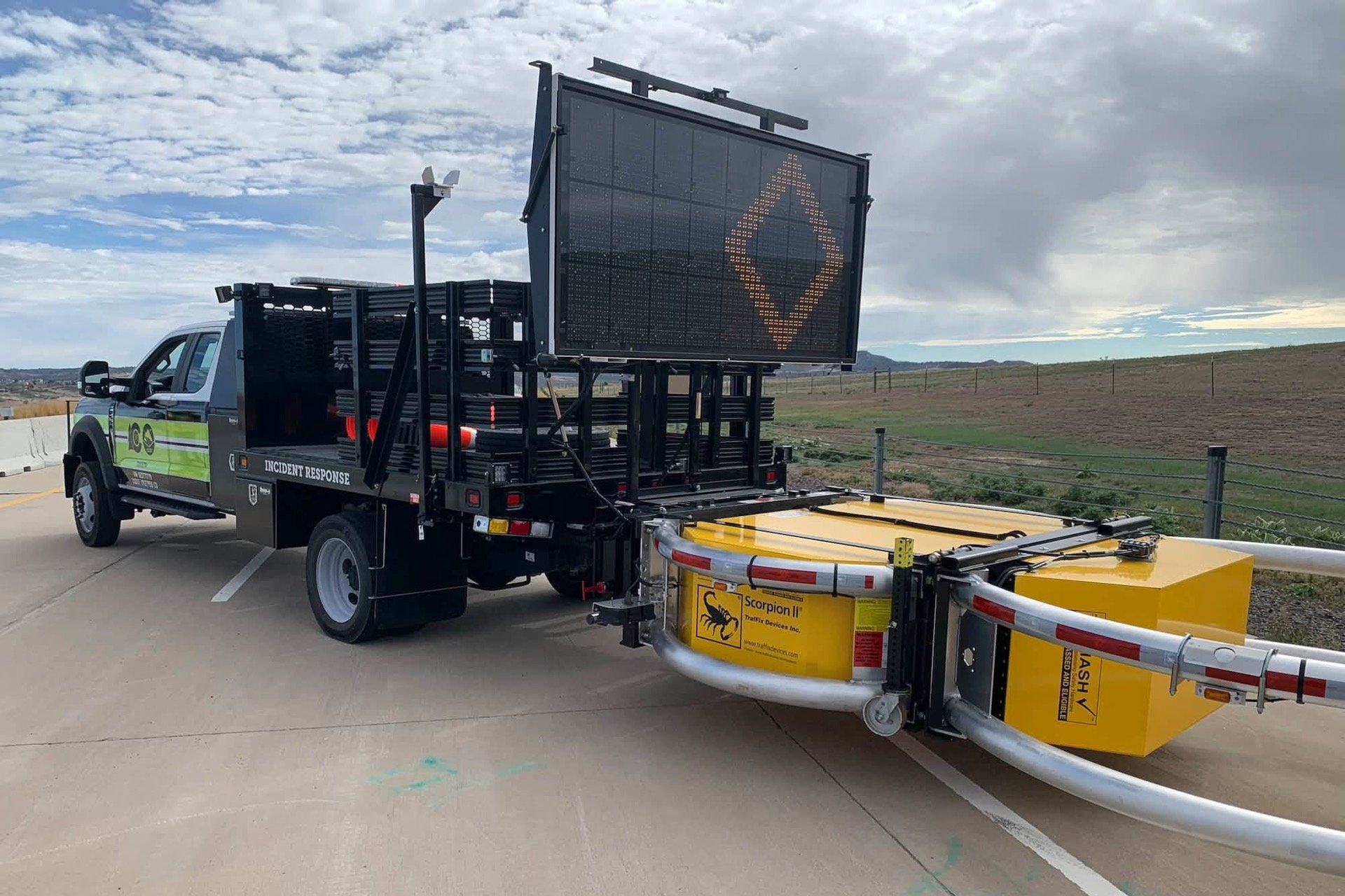 Coloradoâs Plan to Protect Emergency Workers on the Shoulder? Giant, Neon Green Ford Trucks