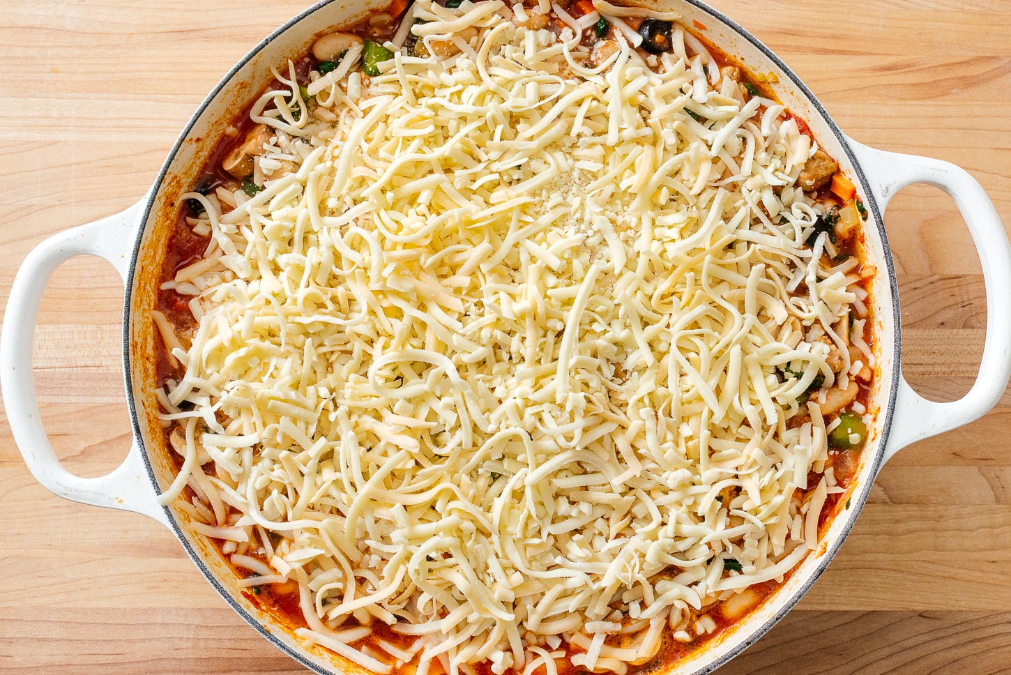 topping pizza beans with cheese